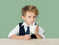 A Caucasian Boy Drinking Milk Background Studio Portrait