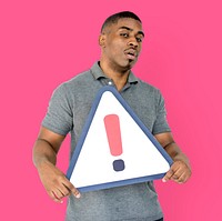 African Descent Man Holding Warning Sign