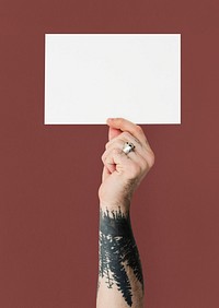 Tattoo Hand Holding Placard Isolated with Background