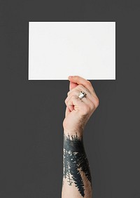 Tattoo Hand Holding Placard Isolated with Background