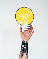 Person Holding Lightbulb Studio Concept