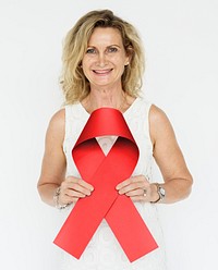 Hands Hold Red Ribbon AIDS HIV