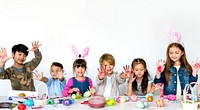 Group of Students Painting Easter Egg Fun on White Blackground