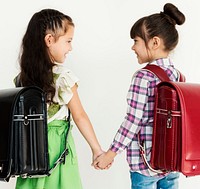 Two friends going to school together