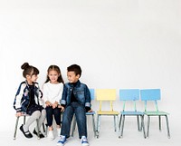 Group of Schoolers Talking Smiling Together on White Background