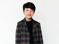 Asian boy is in a studio shoot.