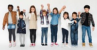 Group of Kids Holding Hands Face Expression Happiness Smiling on White Blackground