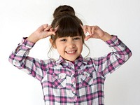Little cute and adorable girl smiling studio portrait