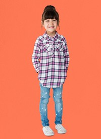 Young girl with a bun smiling full body portrait