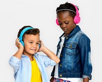 Kids enjoying listening to music with headphones