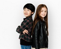 Two kids standing back to back portrait