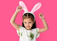 A caucasian girl with a bunny hairband.