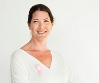 Woman with a pink ribbon for breast cancer awareness 