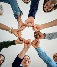 Diverse People Hands Fists Together Partnership