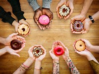 People Hands Hold Share Doughnuts