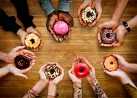 People Hands Hold Share Doughnuts