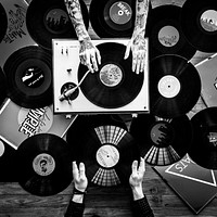 Hands with Vinyl Record Player Music