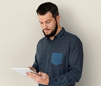 Adult Caucasian Man Using Digital Tablet