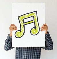 People holding music icon on a paper