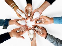 Diversity hands holding innovation lightbulb energy