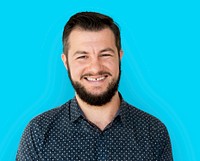 Man standing and smiling for photoshoot