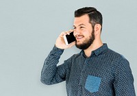 Man standing and using phone to pose for photoshoot