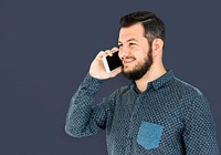 Man standing and using phone to pose for photoshoot