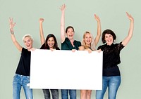 Happiness group of women arms raised and holding blank banner