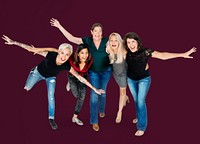 Happiness group of women arms stretched and huddle playful
