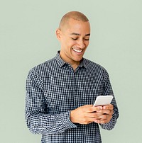 A guy is smiling using smartphone