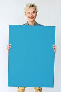 Happiness woman holding blank banner studio portrait