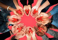 Group of hands holding red ribbon stop drugs and HIV/AIDS awareness