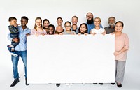 Group of people holding a banner