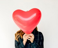 Young Adult Woman Hands Holding Heart Balloon