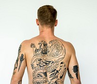 A man full of tattoos