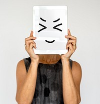 Woman Face Covered with Digital Tablet