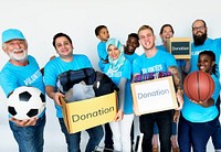 Group of volunteer people donate stuff for charity