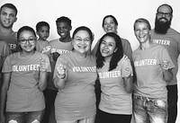 Group of volunteer people smiling together