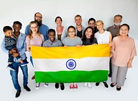 Group of people holding indian flag studio portrait