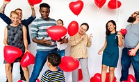 Group of Diverse People Holding Heart Balloons Cheerful