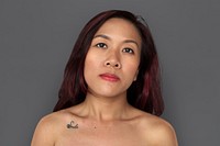 Asian woman bare chest topless studio portrait