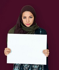 Woman standing and holding Banner