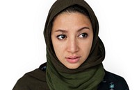 Face portrait of a teary eyed woman with a scarf