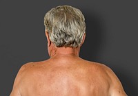 Man shirtless rear view studio portrait