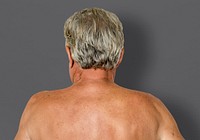 Man shirtless rear view studio portrait