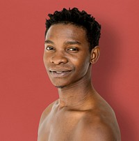 Happiness african man smiling bare chest studio portrait