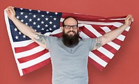 Man holding flag and posing for photoshoot