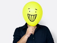 People Faces Covered with Happy Expression Emotion Balloons