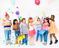 Group of kids celebrating party and having fun together