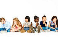Group of kids studio shoot and sitting together